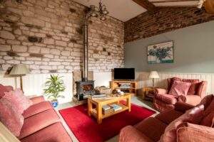 Ostlers Corner Living room and log burner